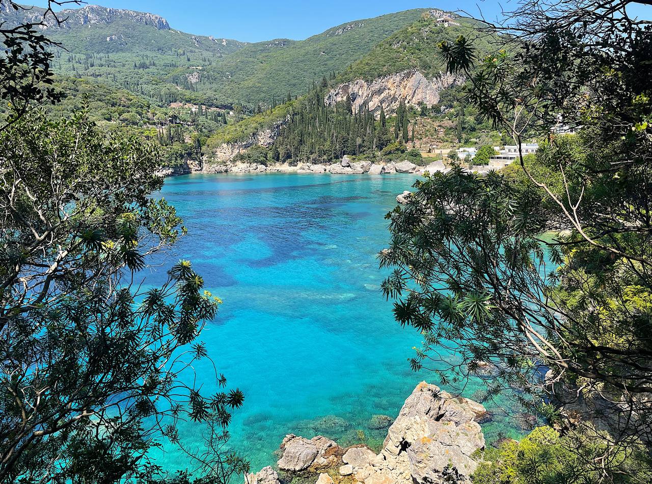 Turquoise waters in Rovinia beach, Liapades, Corfu island, Greece